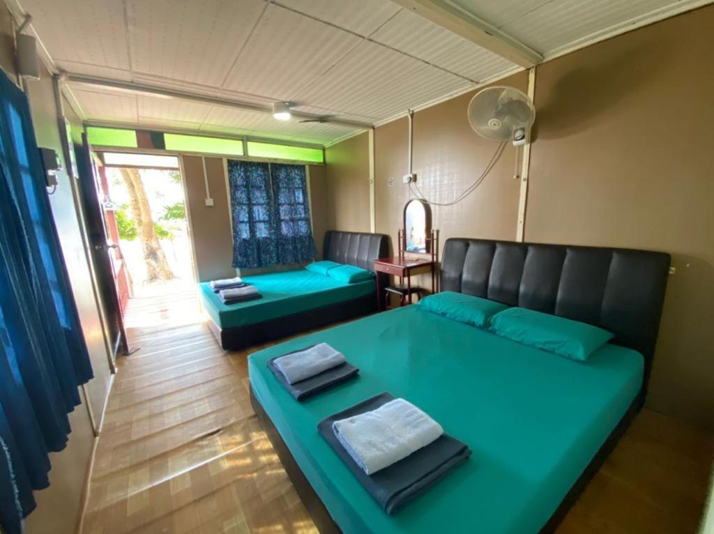 Sri Sentosa Chalet Кампонг-Мукут Экстерьер фото